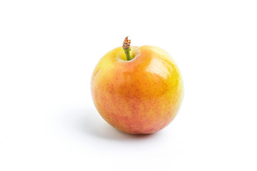 Fresh plums on white background