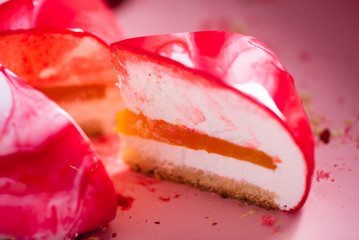 mousse cake with mango puree and cream