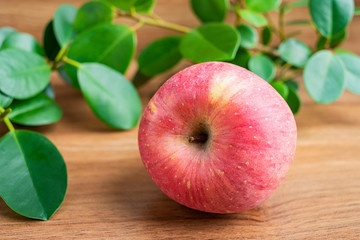 Red apple on the desktop