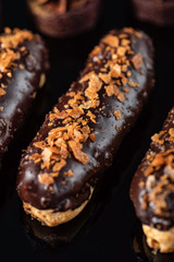 Traditional French dessert. Eclair with chocolate icing.