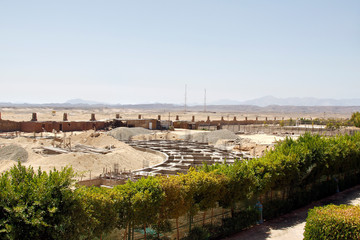 Construction in the desert. Construction of a new hotel on the shores of Egypt.Construction in the desert. Construction of a new hotel on the shores of Egypt.