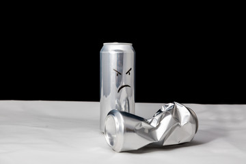 Angry man beat the weak concept. 2 aluminium cans with drawed faces Emoticons emoji