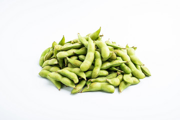 Fresh soya / bunch of green edamame on white background