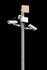 CCTV systems surveillance security camera video equipment on pole outdoor building safety system area control and flammable device wireless connection isolated on black background.