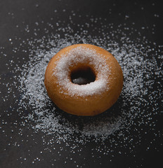Donut sprinkled with sugar. Donut sprinkled with Granulated sugar