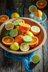 Healthy mix of citrus fruits with on rustic table