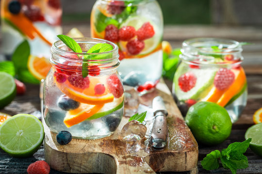 Fresh lemonade with mix of fruits with in sunny day