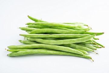 Fresh green beans on white background
