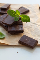 dark chocolate, mint leaves close up.