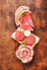 Fresh raw meat and spices. Barbecue set. View from above.