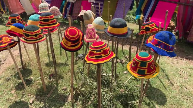 Colorful hats sold at a local rural market in Ethiopia tc02