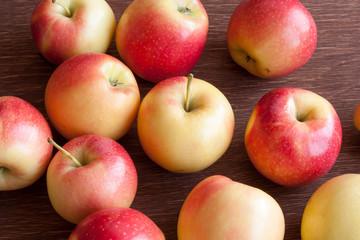 apples scattered on a wooden table