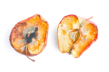 rotten apple on white in top view