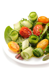 Fresh vegetable salad on white background, isolated