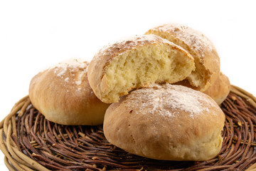 Fresh baked homemade bread in a wicker wood basket