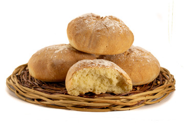 Fresh baked homemade bread in a wicker wood basket