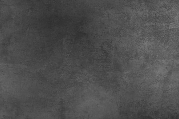 Dark grey black cement floor abstract background texture. Blank dark grey worn floor. Abstract background
