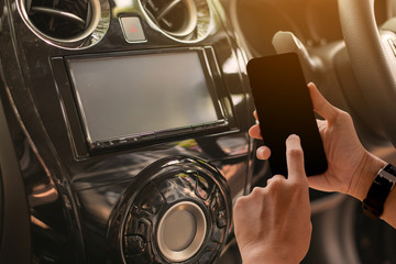 Using Mobile Phone Device While Driving. Hands Free Talking and Listening Online Music While...