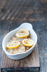 Baked fish fillet in butter and lemon sauce