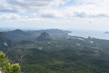 Panorama view from a big rock over Krabi at the jungle hiking trail to dragon crest in Khao Ngon Nak in Krabi, Thailand, Asia