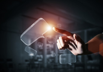 Concept of communication by glass empty chat icon on gray background. Mixed media