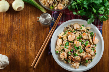 Fried rice with shrimp and vegetables served on a plate