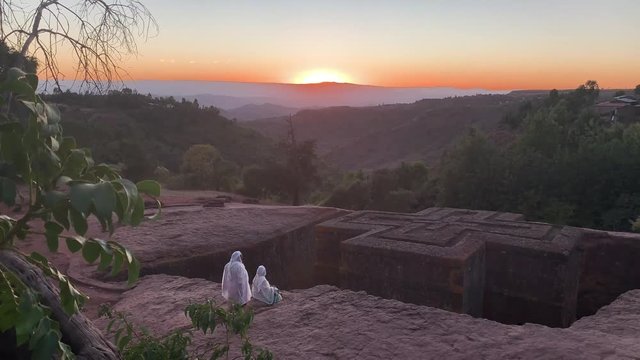 The rock-hewn monolithic Church of St. George at Lalibela as sun sets December 2018, tc01