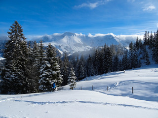 Fototapeta na wymiar view on Kaiseregg peak covered in snow, Swiss Alps, winter hike from Schwarzsee to Fuchses Schwyberg, Fribourg (Freiburg) canton, Switzerland, Europe