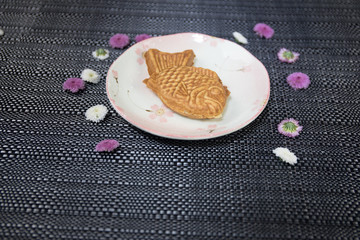 Close up view of plate with japanese food inside. Japan traditional food on wooden table.