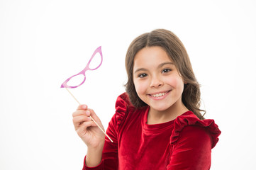 Fun and entertainment. Kid happy wear eyeglasses photo booth props party accessory. Girl hold eyeglasses for party. Child cute smiling face with party accessory. All you need organize birthday party