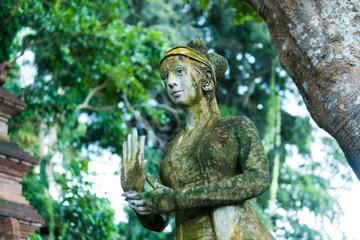 Close up woman statue Indonesian-style, Fairy statue in the garden, lady in the garden, Beautiful woman statue in the park. Taman Tirtagangga temple on Bali