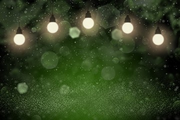 green fantastic brilliant glitter lights defocused bokeh abstract background with light bulbs and falling snow flakes fly, festal mockup texture with blank space for your content