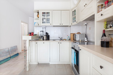 Modern bright domestic classic kitchen interior with with appliances