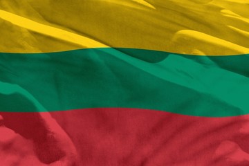 Waving Lithuania flag for using as texture or background, the flag is fluttering on the wind