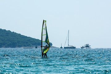 A picture of a windsurf on the sea during the hot summer day. Pictured in Croatia. 