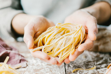 Chef making fresh italian pasta