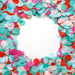 Circle frame colorful confetti celebration on white background. Party background.