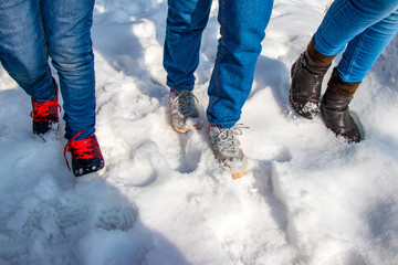 Girls walking in the snow, footprint in snow