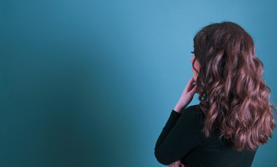 pensive girl looking up