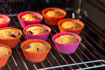 cupcakes with cherry, muffins in the oven