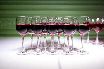 Glasses on table's bar indoor. alcoholic drink