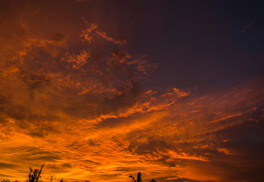 Dramatic golden hours burning cloudy sky sunset high resolution image