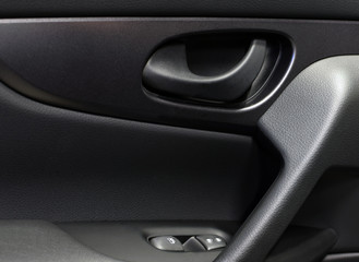 Interior details of modern car door.