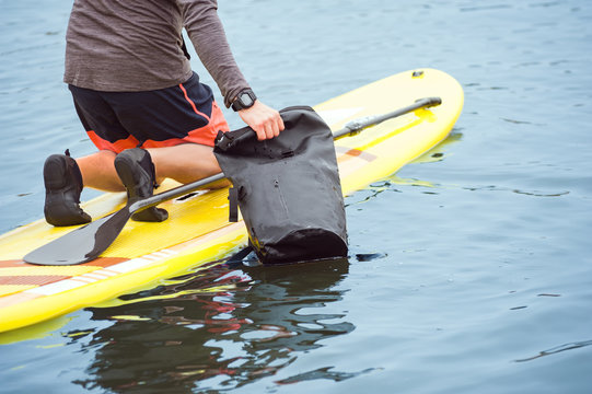 Using of waterproof bag for water sports