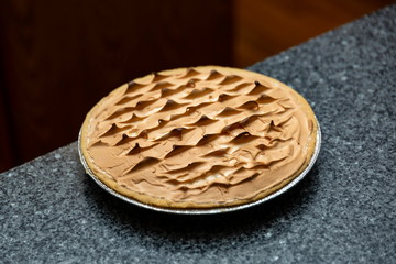chocolate meringue pie before it was cut for serving