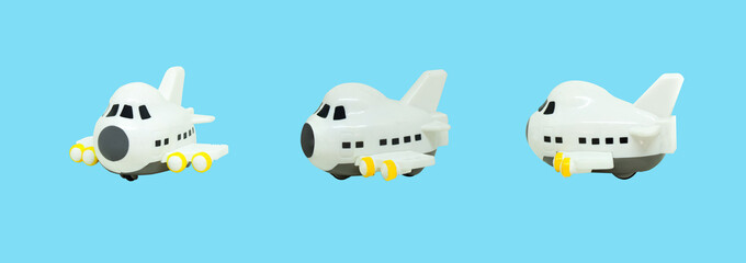 Fototapeta premium White small airplane toys isolated on blue background.