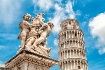 Fotobehang De scheve toren Leaning Tower of Pisa with sculture in front, Italy.