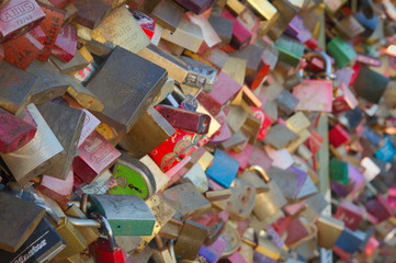 Fototapeta premium lovelock padlocks with love messages an a bridge in cologne