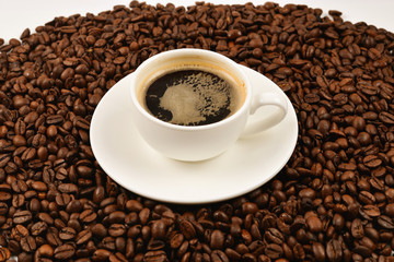 Fototapeta premium Cup of coffee and coffee beans.