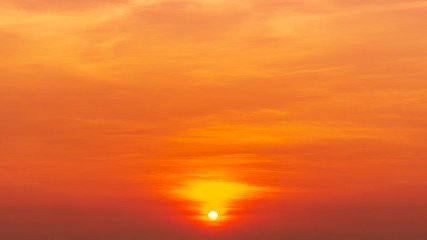 Naklejka na ściany i meble Nature background of the sunrise on the orange sky